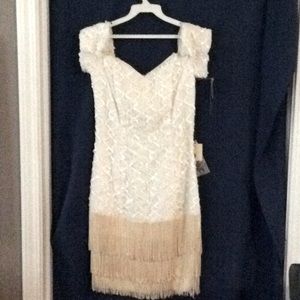 Dress size 4-5, Off the shoulder, new with tags.